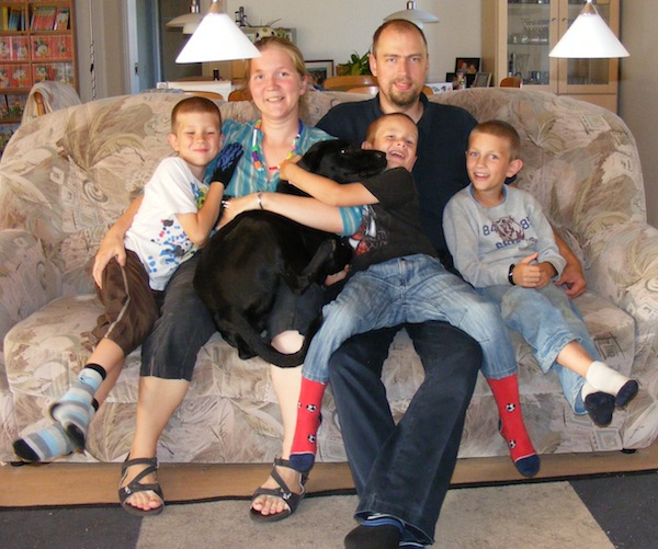 The family on the couch at Casa Nosotros